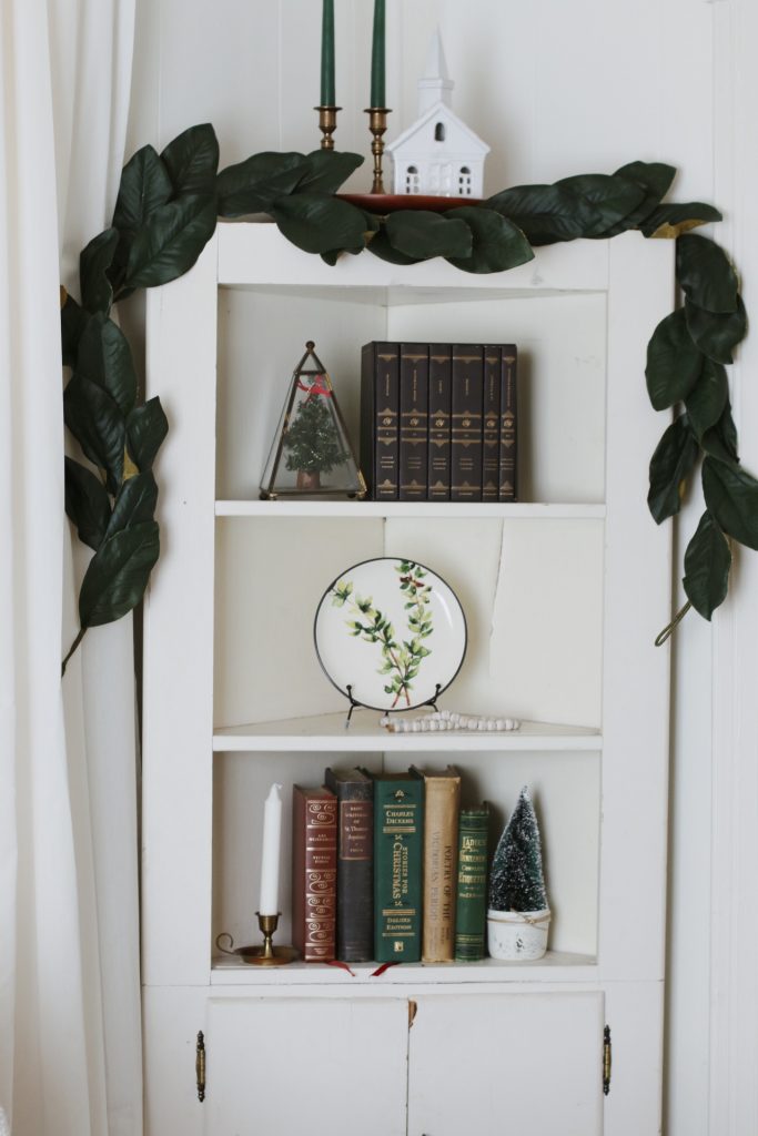 corner cabinet with Christmas decor