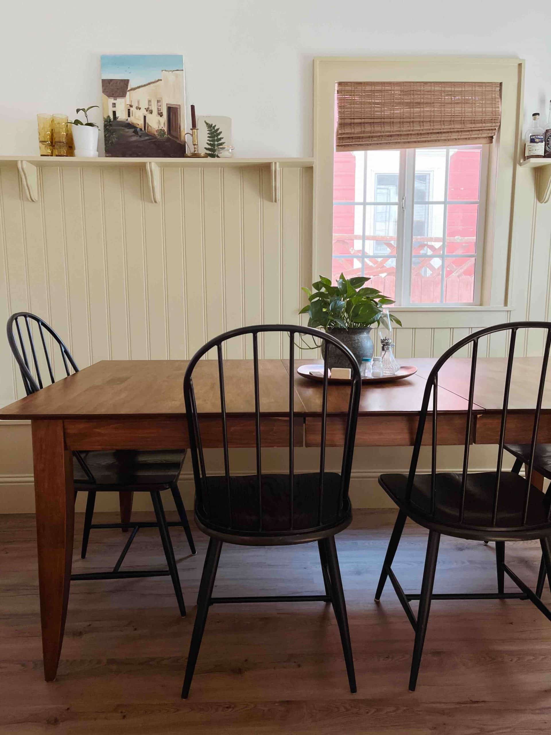 dining room table with black dining chairs