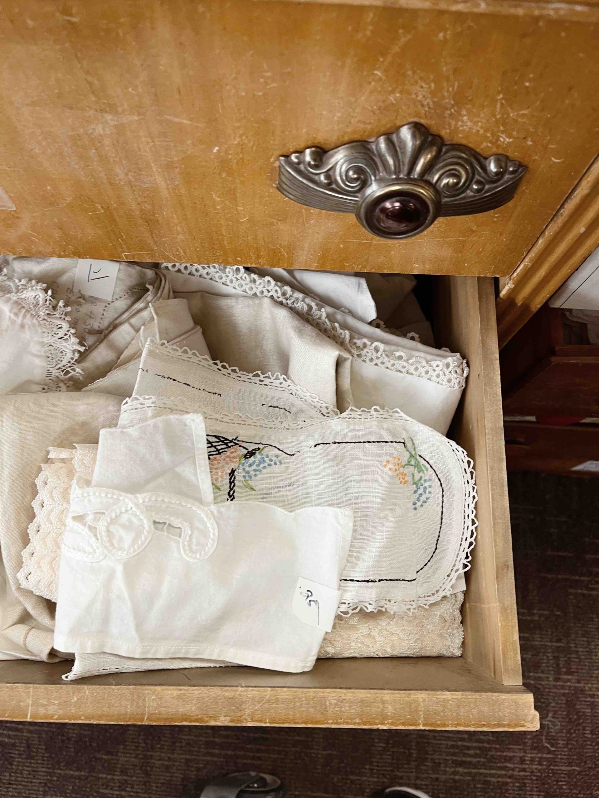 vintage napkins in dress drawer in colorado springs thrift store
