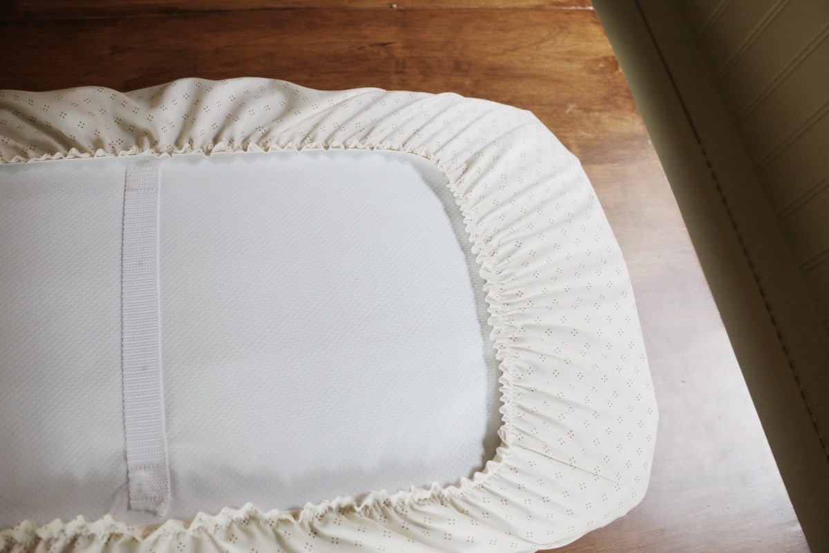 back of changing pad with cover on it
